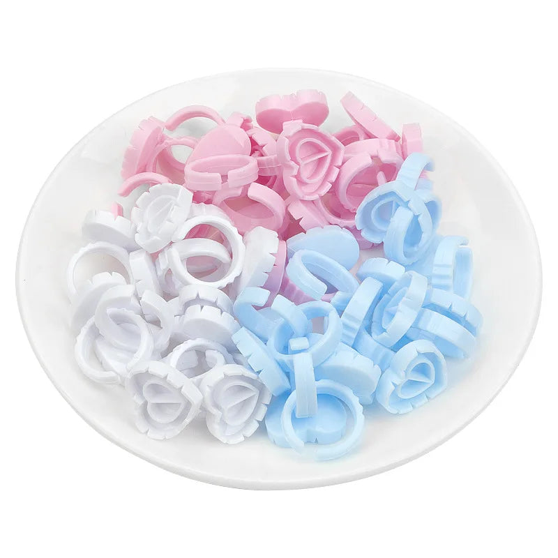 100 PCS Disposable Heart-shaped Plastic Glue Ring Cup Eyelash Extension Tattoo Pigment Holder Pallet Lash Makeup Supplies Tools